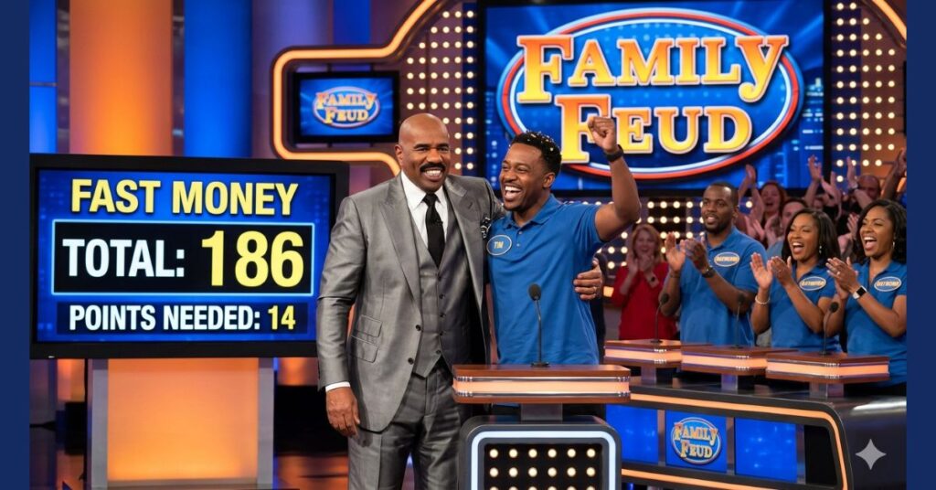 Tim Raymond and Steve Harvey celebrating a high score during the Family Feud Fast Money round